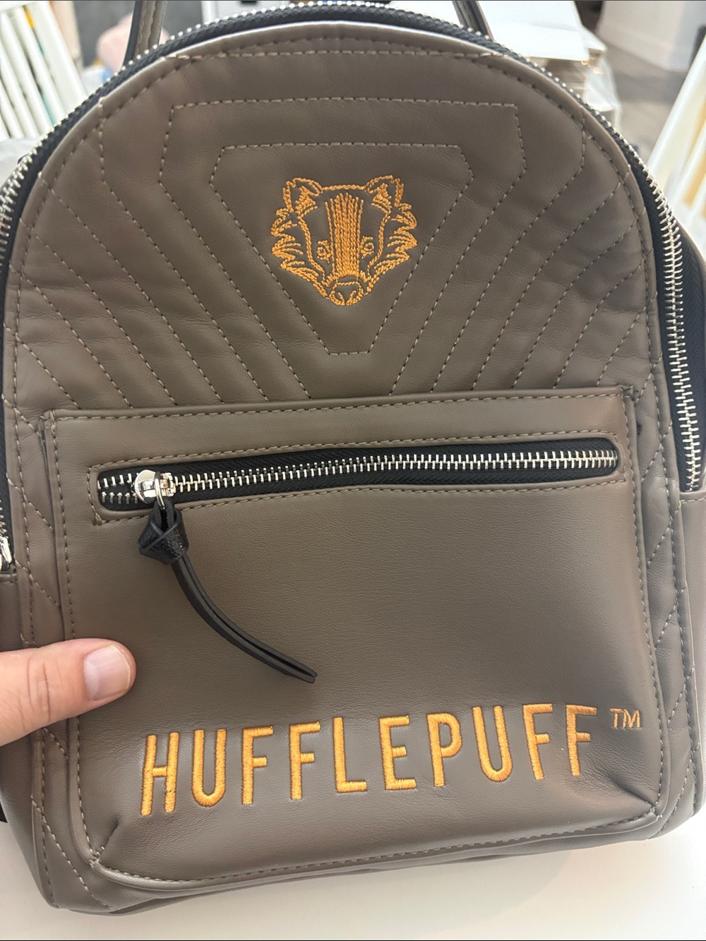 Danielle Nicole Taupe Mini Backpack with Yellow Embroidery Hufflepuff tm